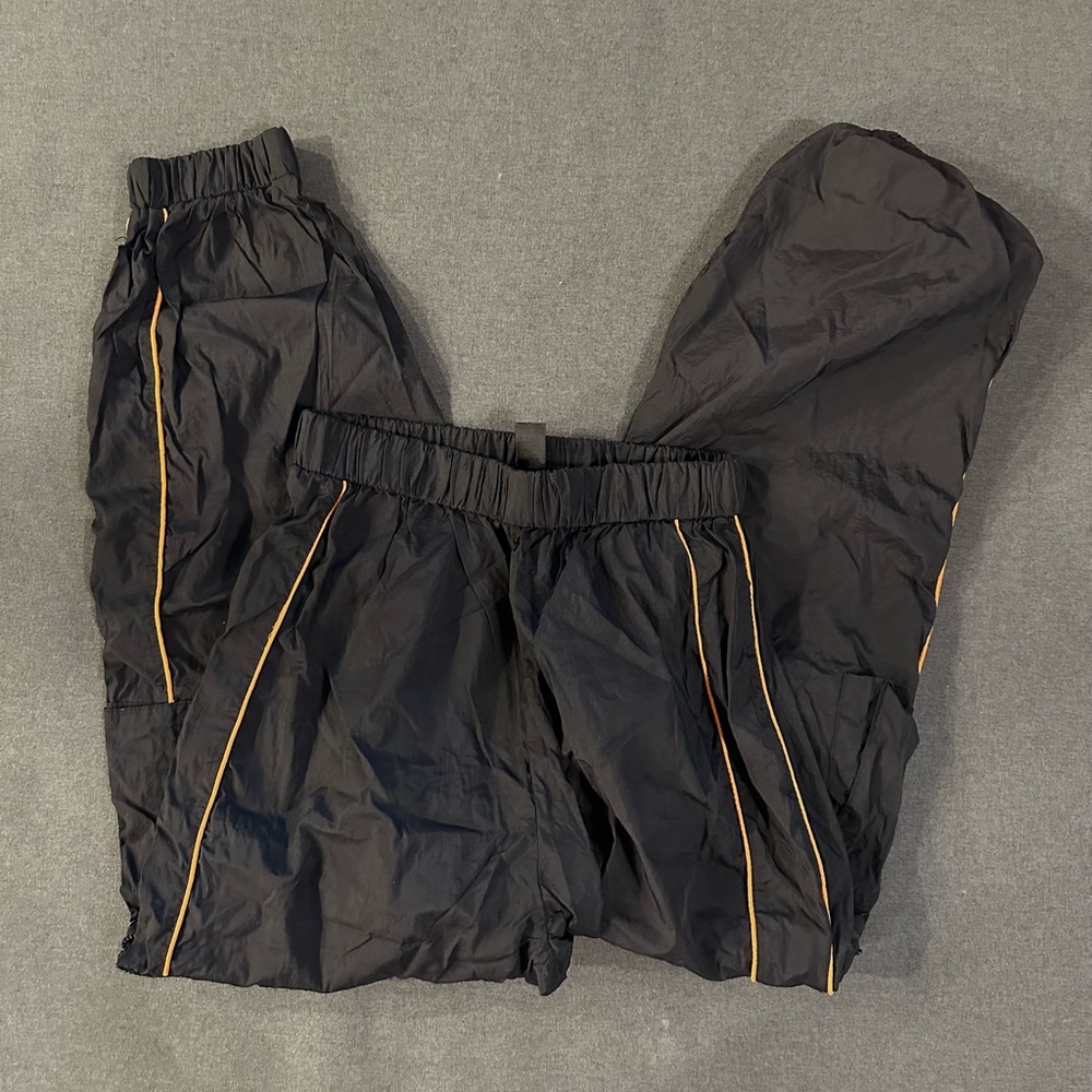 Small SHEIN Black and orange track pants with a streetwear vibe streetwear